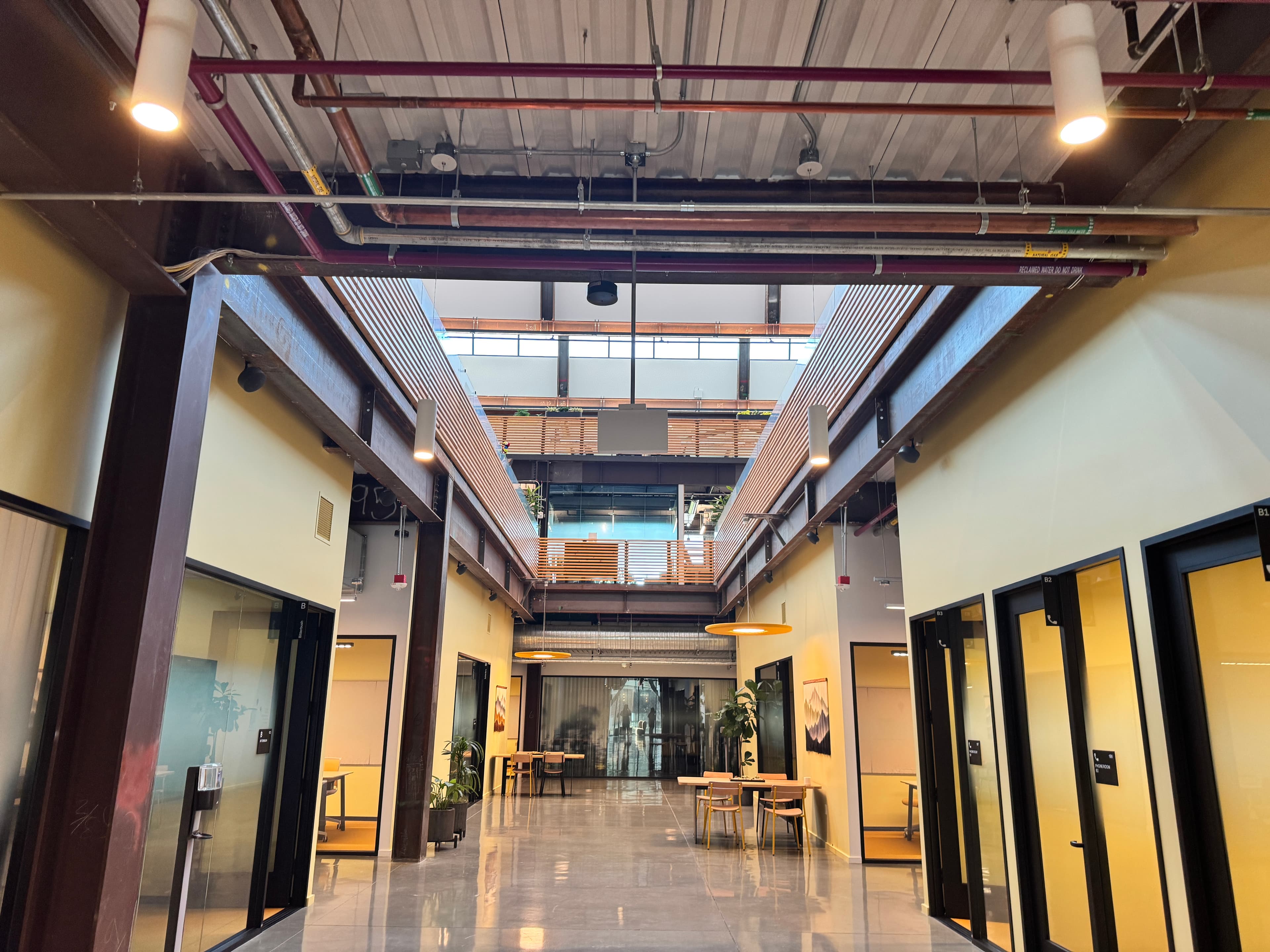 Atrium with exposed ceiling and multi-level walkways